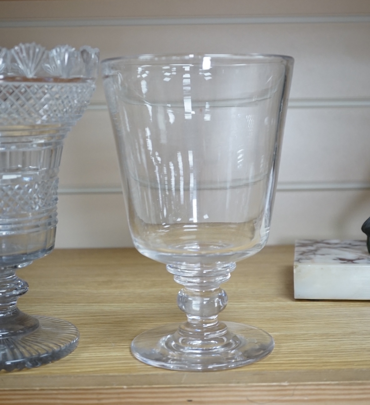 A Regency cut glass vase and a near pair of celery vases, largest 21cm high. Condition - good